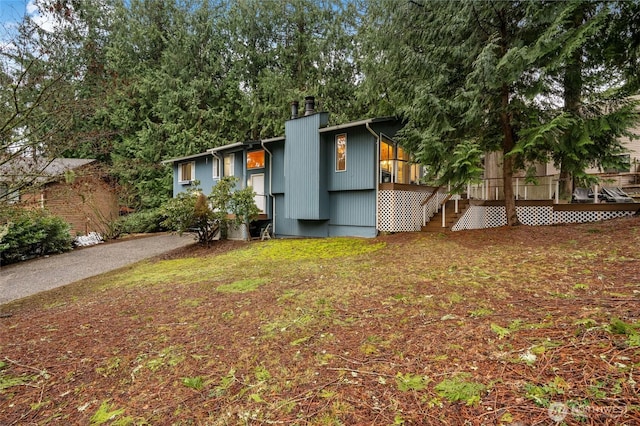 view of front of property featuring stairs