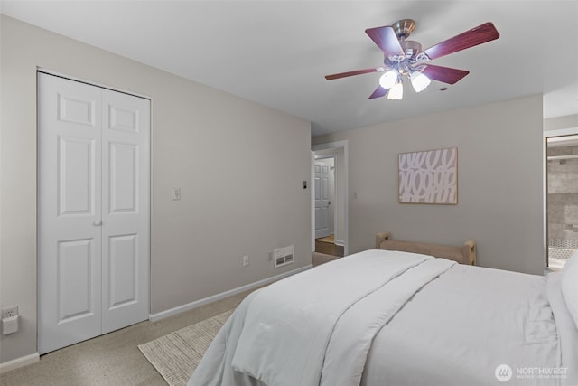 bedroom with visible vents, carpet, baseboards, and a ceiling fan
