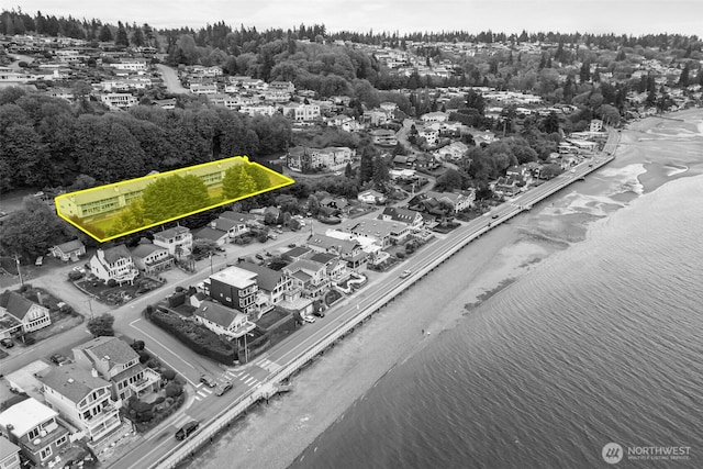 drone / aerial view featuring a water view