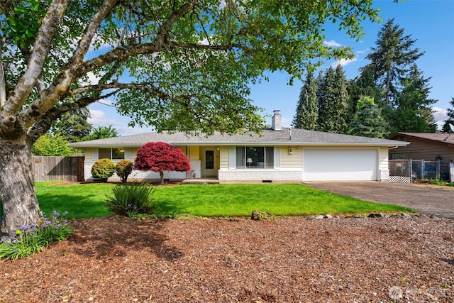 single story home with a chimney, fence, a garage, and aphalt driveway