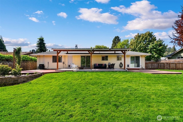 rear view of house with an outdoor hangout area, a yard, fence, and a patio