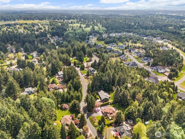 aerial view with a view of trees and a residential view