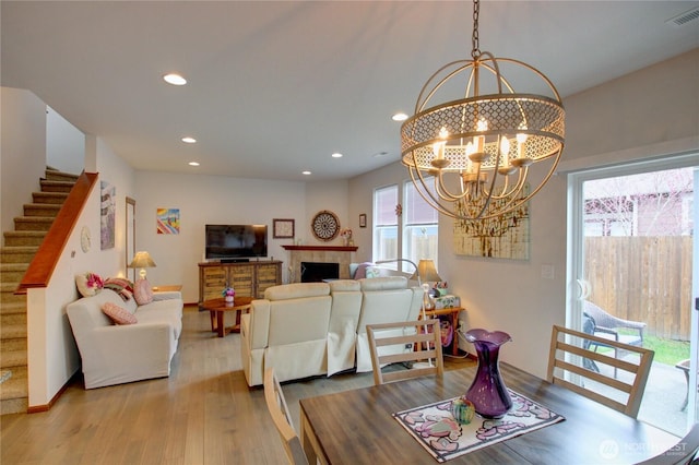 454 S 48th St, Mount Vernon, WA 98274 - dining room featuring visible vents, stairs, wood finished floors, a chandelier, and recessed lighting