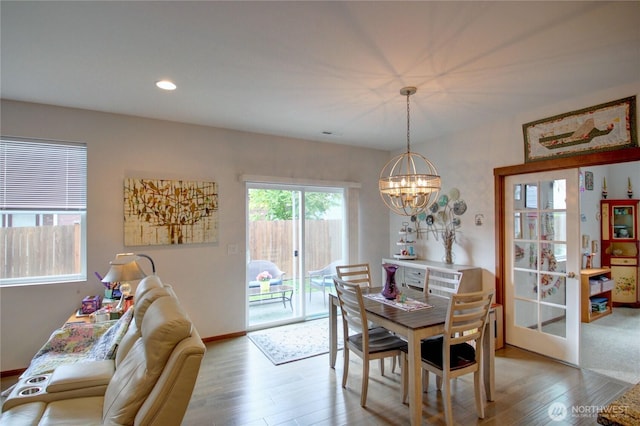 454 S 48th St, Mount Vernon, WA 98274 - dining area featuring baseboards, recessed lighting, wood finished floors, and a notable chandelier