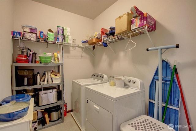 454 S 48th St, Mount Vernon, WA 98274 - washroom featuring baseboards, light tile patterned floors, laundry area, and washer and clothes dryer