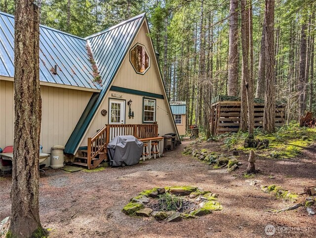 121 Sunstone Rd, Packwood, WA 98361 - back of property with metal roof