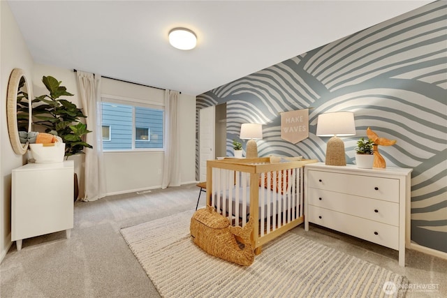 bedroom featuring carpet floors and baseboards