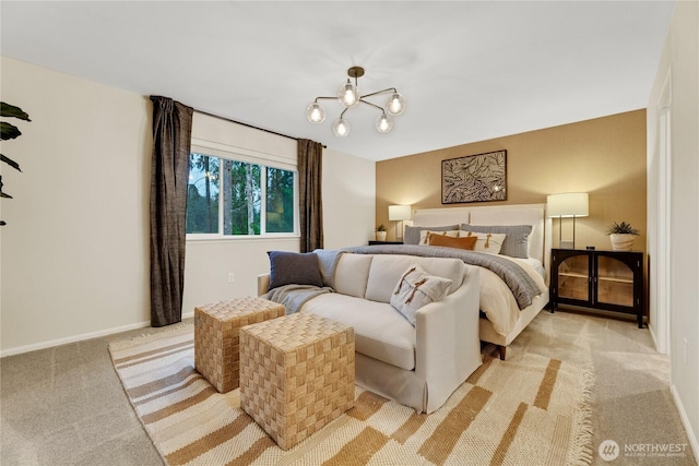 bedroom featuring baseboards, a notable chandelier, and light carpet