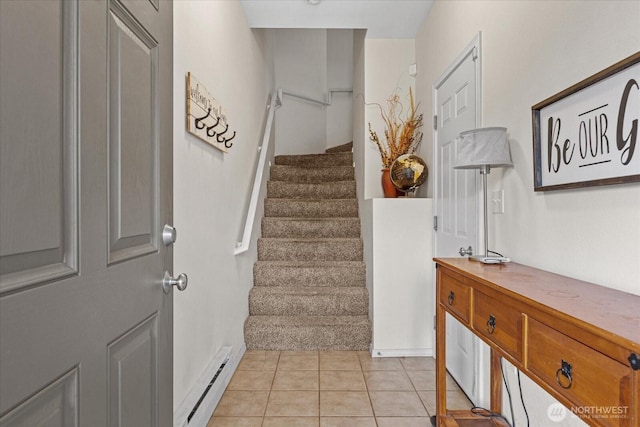 stairs with tile patterned flooring and baseboard heating