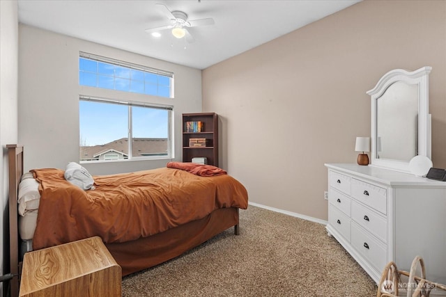 bedroom with baseboards, ceiling fan, and light carpet
