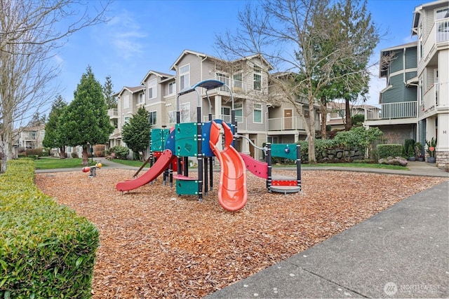community play area with a residential view