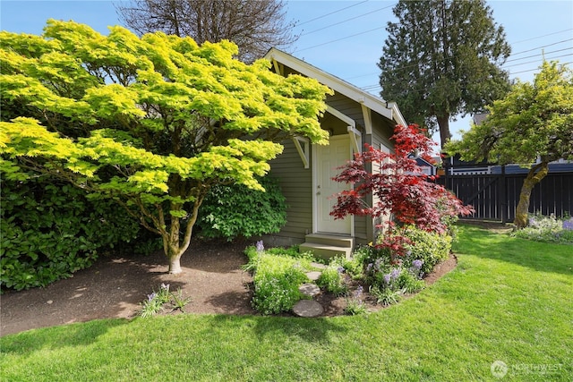 view of outdoor structure with fence