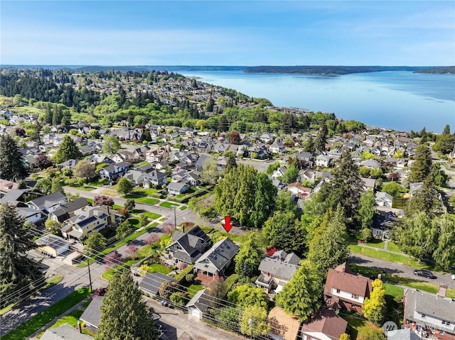 aerial view with a water view and a residential view