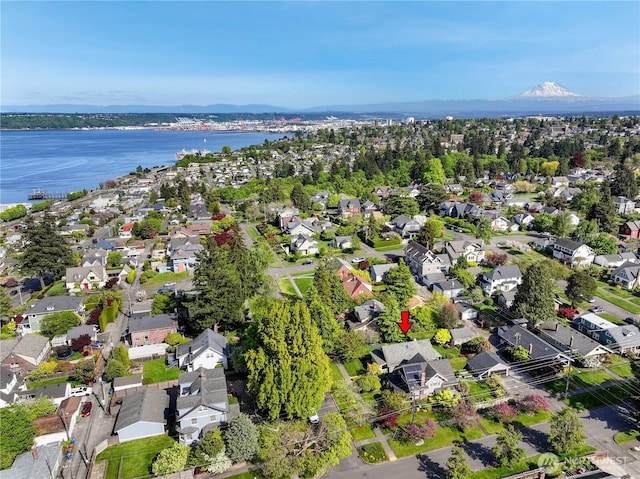 aerial view with a water view and a residential view
