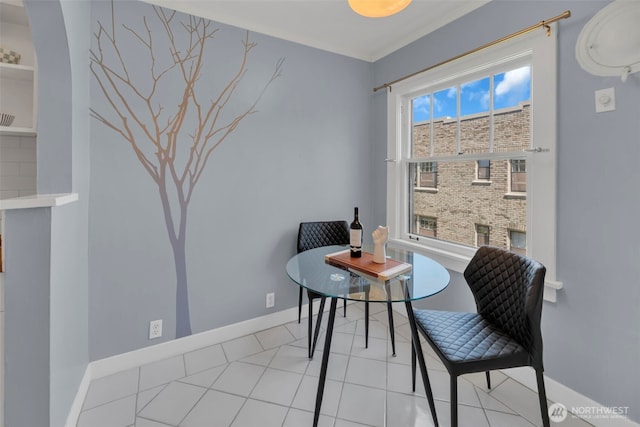 dining space with baseboards