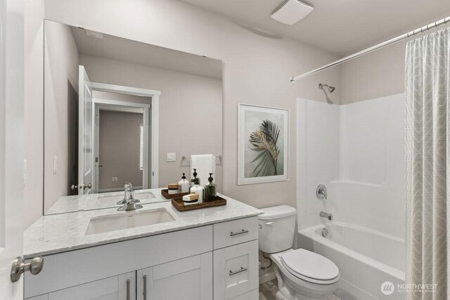 bathroom with vanity, toilet, and shower / tub combo with curtain