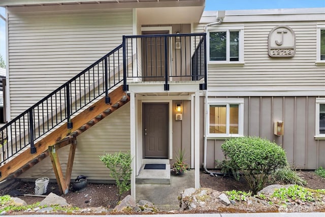 entrance to property featuring board and batten siding