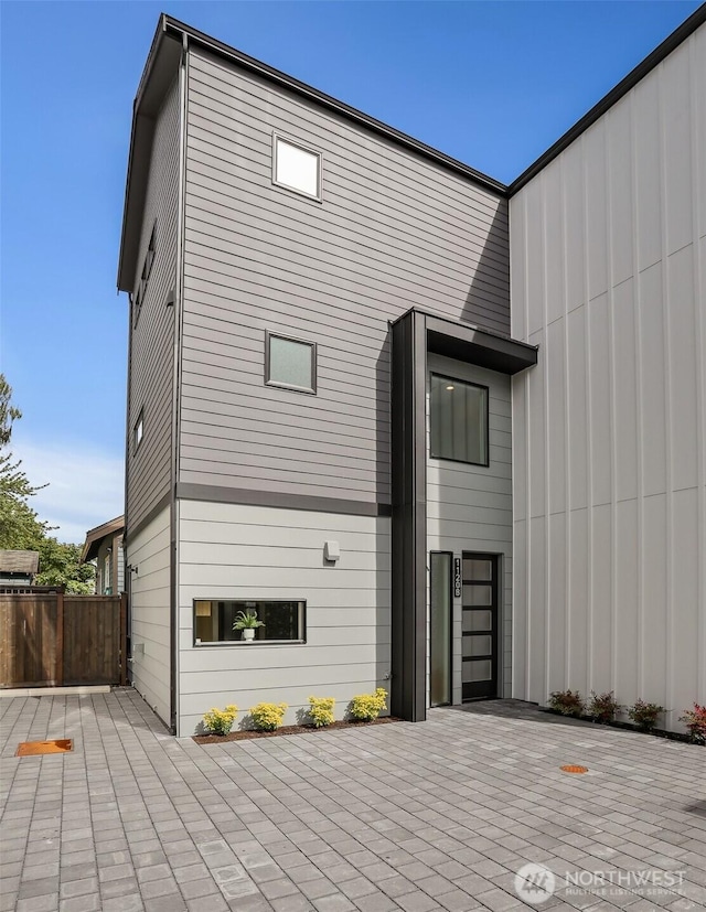 1120 NW 61st St Unit B, Seattle, WA 98107 - back of property featuring a patio
