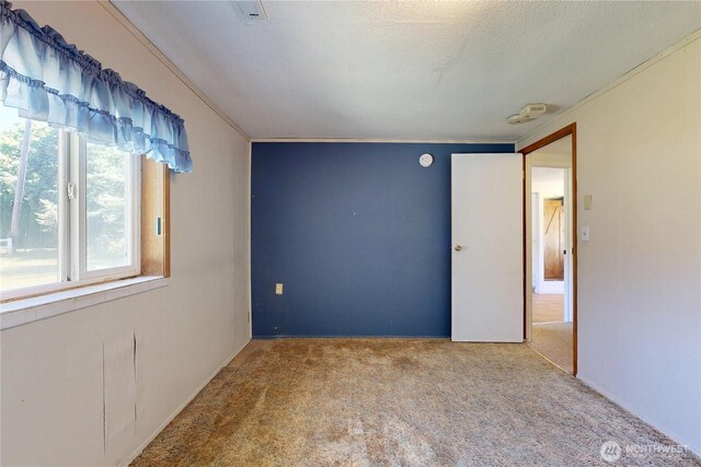 1557 Shelton Rd, Walla Walla, WA 99362 - carpeted empty room with crown molding and a smoke detector