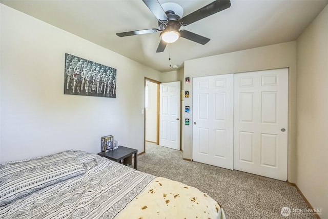 201 3rd St NE, Yelm, WA 98597 - bedroom featuring baseboards, carpet flooring, a closet, and ceiling fan