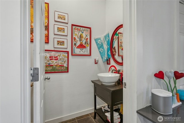 bathroom featuring vanity and tile patterned flooring
