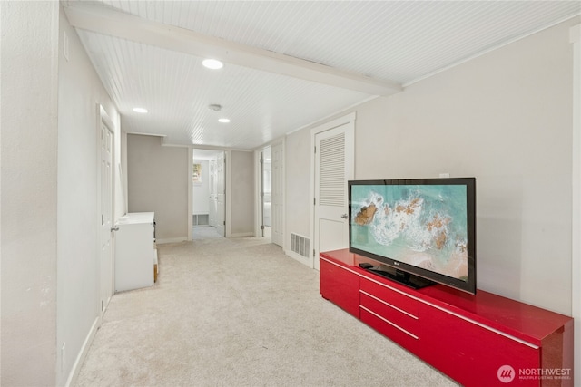 unfurnished living room featuring carpet flooring, recessed lighting, baseboards, and visible vents