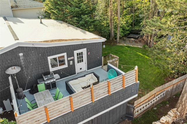 exterior space with an outdoor hangout area and a yard