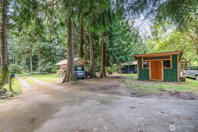 exterior space featuring a carport