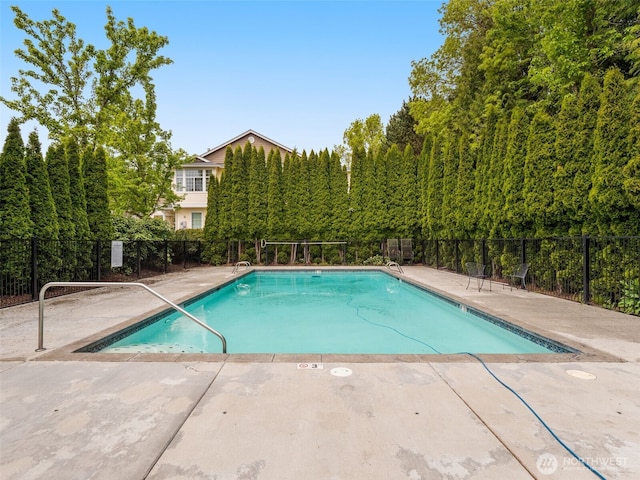 pool featuring fence