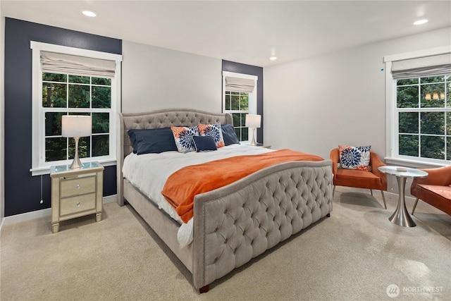bedroom featuring recessed lighting, baseboards, and light colored carpet