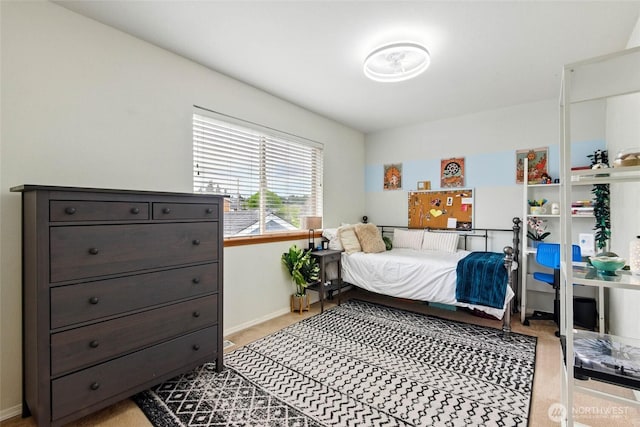 bedroom with baseboards