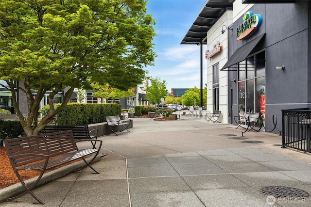 surrounding community with a patio area