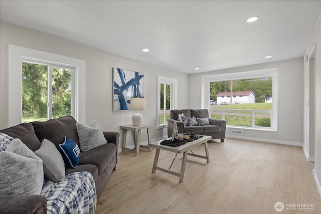 8661 State Highway 303 NE, Bremerton, WA 98311 - living area with recessed lighting, baseboards, visible vents, and light wood-type flooring