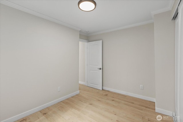 8661 State Highway 303 NE, Bremerton, WA 98311 - empty room with crown molding, baseboards, and wood finished floors