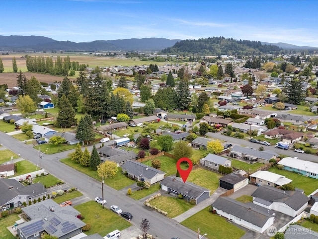 bird's eye view with a mountain view and a residential view