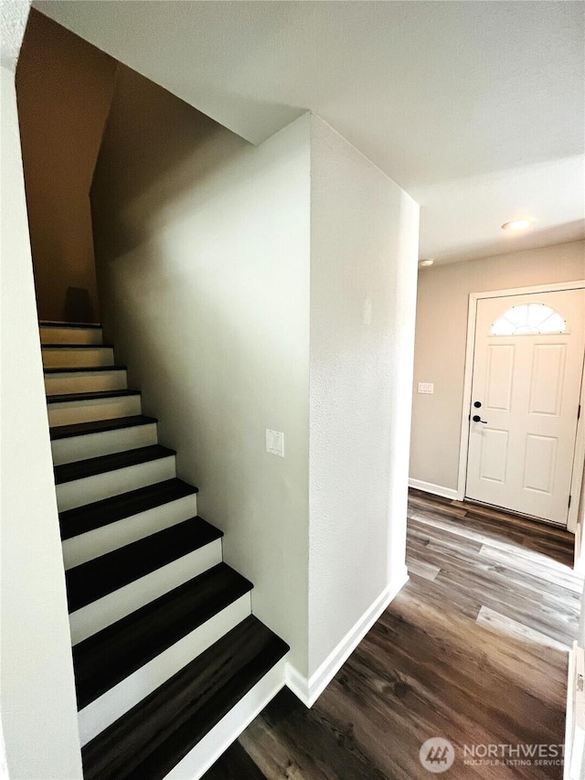 19573 2nd Ave NE, Poulsbo, WA 98366 - staircase with wood finished floors, baseboards, and recessed lighting