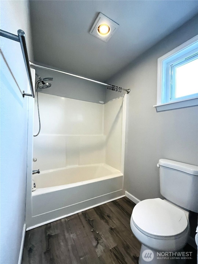 19573 2nd Ave NE, Poulsbo, WA 98366 - full bath featuring baseboards, toilet, bathtub / shower combination, and wood finished floors