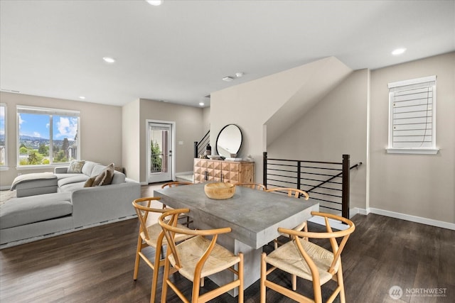 dining space with recessed lighting, baseboards, and dark wood-style flooring