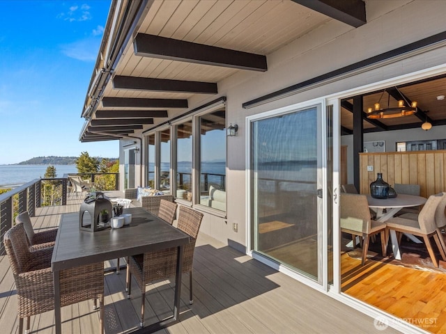 2690 SW 151st Pl, Burien, WA 98166 - deck featuring outdoor dining area and a water view