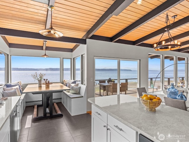 2690 SW 151st Pl, Burien, WA 98166 - kitchen featuring light stone countertops, breakfast area, a water view, white cabinets, and wooden ceiling