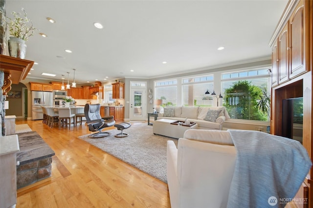 2961 Kendall Rd, Walla Walla, WA 99362 - living area with crown molding, plenty of natural light, light wood-type flooring, and recessed lighting