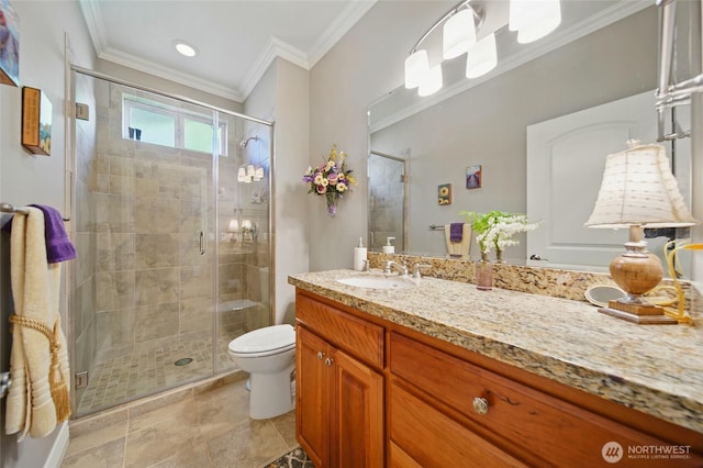 2961 Kendall Rd, Walla Walla, WA 99362 - bathroom with vanity, toilet, a shower stall, and crown molding