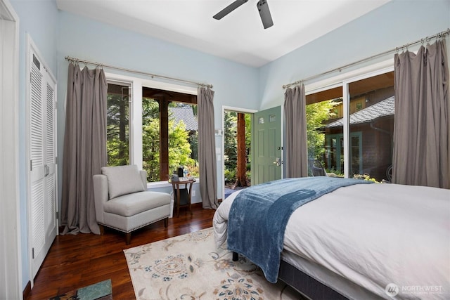 2141 Northshore Rd, Bellingham, WA 98226 - bedroom with multiple windows, a ceiling fan, access to outside, and wood finished floors