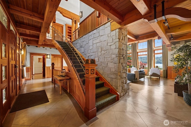 2141 Northshore Rd, Bellingham, WA 98226 - stairway with tile patterned flooring, wood ceiling, and beamed ceiling