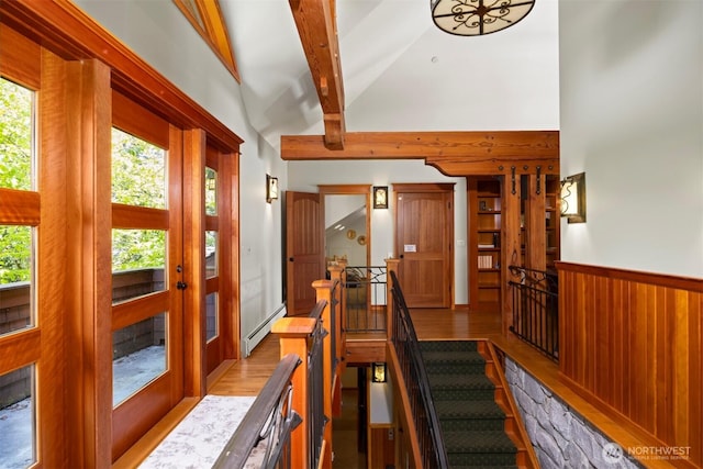 2141 Northshore Rd, Bellingham, WA 98226 - interior space with plenty of natural light, a baseboard radiator, wood finished floors, and high vaulted ceiling