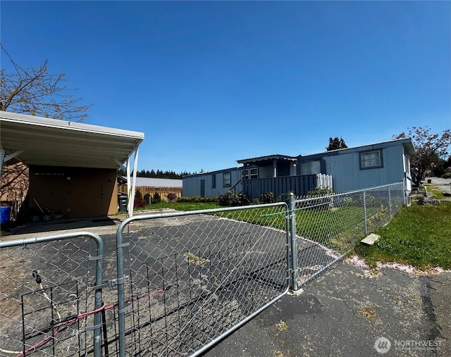 view of front of property featuring fence
