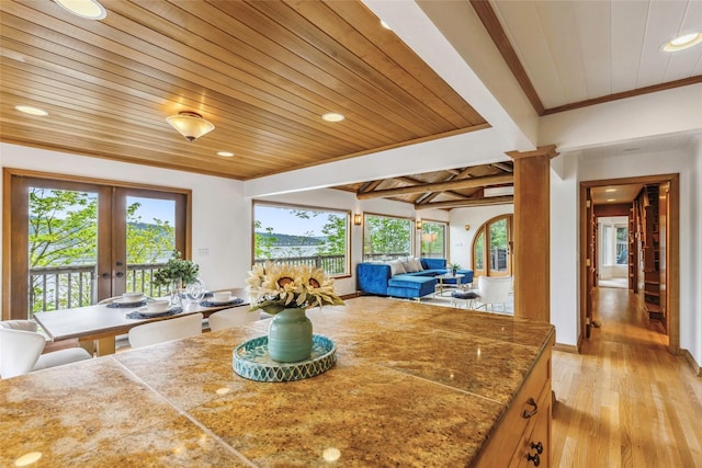 dining space with light wood-style floors, french doors, recessed lighting, wooden ceiling, and ornamental molding
