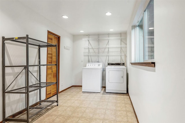 clothes washing area with laundry area, baseboards, light floors, recessed lighting, and washing machine and clothes dryer