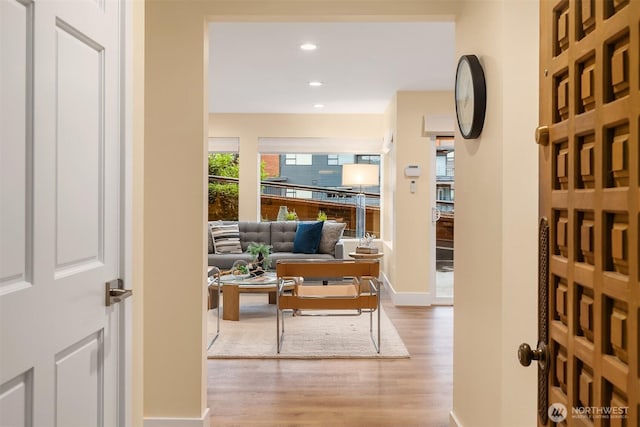 2320 43rd Ave E Unit 15A, Seattle, WA 98112 - hall with wood finished floors, recessed lighting, and baseboards