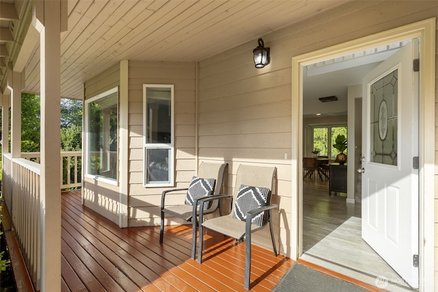 8957 Watson Pl NE, Bremerton, WA 98311 - wooden terrace with covered porch